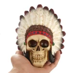 SKULL FIGURINE FEATURING A NATIVE AMERICAN-STYLE FEATHERED HEAD - Image 5